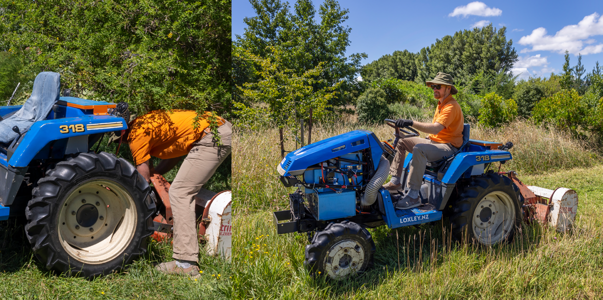 Electric tractor being used for mowing